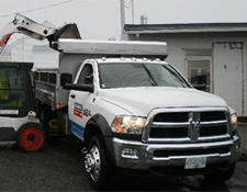 3 Yard Dodge Ram Dump Truck, being loaded by a Bobcat at the Sharecost yard.